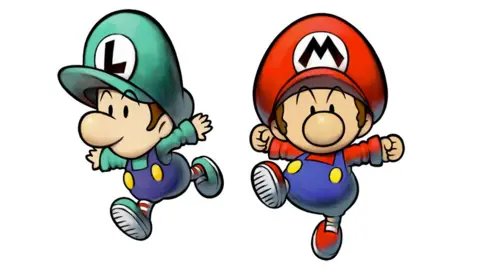 Nintendo A screenshot from Mario Kart 8 Deluxe's Battle Mode shows Mario in a red kart and Yoshi in a green kart. They each have three balloons attached to their karts, and Mario holds a white and orange jump feather in his hand. The concrete track and grass areas of the arena stretch out behind them as Princess Peach races across the background.