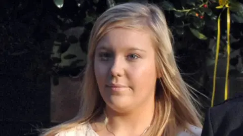 Bethany Haines pictured looking off to the side. She has long straight blonde hair.