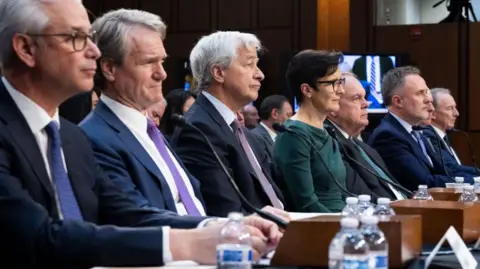 Getty Images Big bank executives including, from left, Wells Fargo chief Charles Scharf, Bank of America boss Brian Moynihan, JPMorgan Chase chairman Jamie Dimon and Citigroup chief Jane Fraser at a hearing in Congress pushing for lighter regulatory requirements