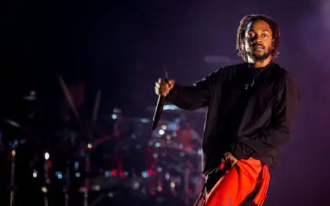 Getty Images The rapper Kendrick Lamar is pictured onstage at a festival in Brazil.