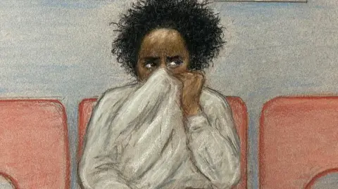 Reuters/Julia Quenzler A court sketch of a young man with curly dark hair holding his jumper up over his mouth and nose