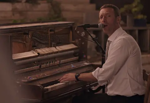 Parlophone Records Chris Martin of Coldplay plays the piano