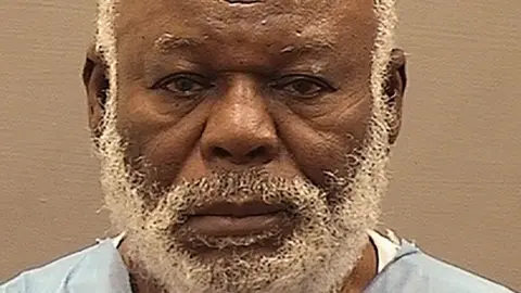 Alexandria Sheriff's Office Mugshot of Abu Agile Masud, whohas a white beard and is looking directly at the camera