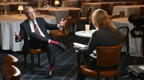 Nigel Farage being interviewed by Laura Kuenssberg