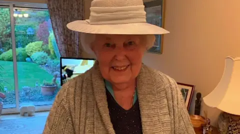 Family handout Mary Lamerton is smiling while wearing a lovely cream hat.