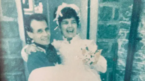 Family Joan Dyche on her wedding day when she married Carl Dyche's father.