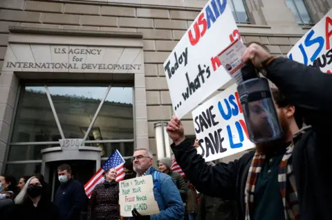 Getty Images Protestors outside office for US Agency for International Development