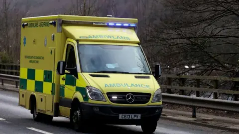 Getty Images A view of staff from the Welsh Ambulance Service Trust answering an emergency call in Abercarn, Wales.