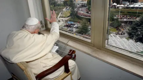Getty Images Late Pope John Paul II delivers his blessing from the window of the Gemelli hospital in Rome