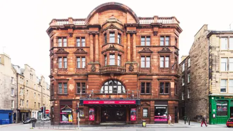 Anneleen Lindsay The front of the King's Theatre from the outide. It is a red sandstone colour.
