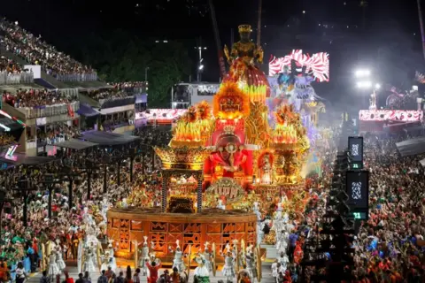 Andre Coelho / EPA Members of the troupe Unidos de Padre Miguel march during the first night of Rio Carnival parades at Marques de Sapucai sambadrome in Rio de Janeiro, Brazil, 02 March 2025.