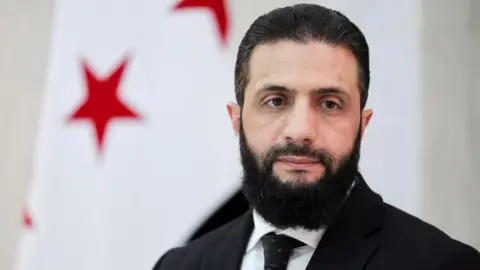Reuters Syrian President Ahmed al-Sharaa attends an interview with Reuters news agency at the presidential palace in Damascus, Syria (10 March 2025)