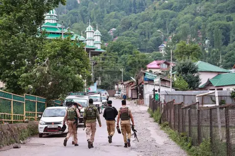 NurPhoto via Getty Images Indian security forces are on the LoC sector in Uri, Jammu and Kashmir, India, on May 7, 2025. Many civilians are injured on the Indian side after their house is hit by Pakistani shelling in Baramulla district. The Indian military says early Wednesday it launches strikes against Pakistan in retaliation for last month's militant attack in Pahalgam, Jammu and Kashmir. (Photo by Nasir Kachroo/NurPhoto via Getty Images)