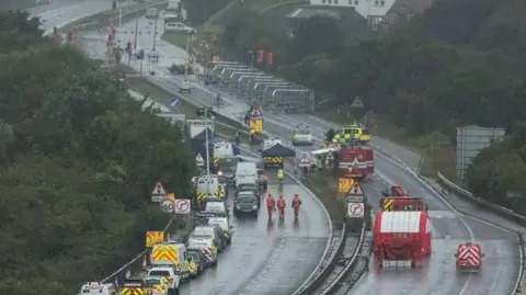 Getty Images aerial shot of emergency services on the A27 near Shoreham in 2015 at scene of the air crash