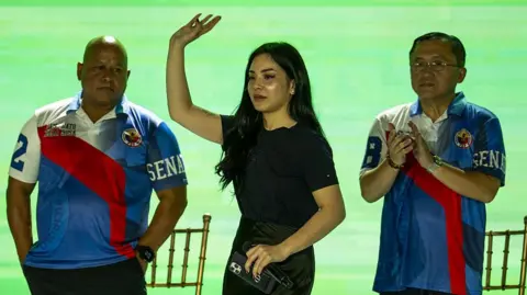 Getty Images Bato dela Rosa, Kitty Duterte and Bong Go