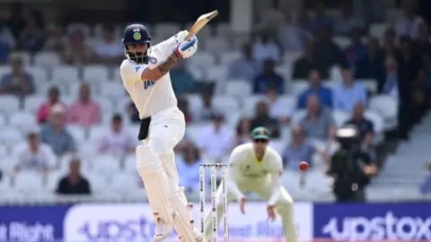 Getty Images Virat Kohli of India bats during day five of the ICC World Test Championship Final between Australia and India at The Oval on June 11, 2023 in London, England.