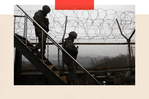 Getty Images South Korean soldiers patrol at a border guard post