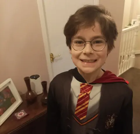 Lisa Martin Casper Martin dresses as Harry Potter