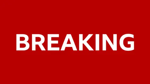 BBC A red banner with the words BREAKING in white