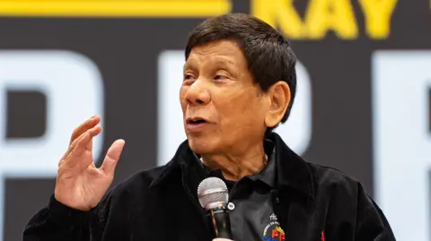 Getty Images Rodrigo Duterte giving a speech before his arrest in March
