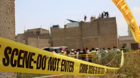EPA Pakistani security officials inspect the site of an alleged Indian drone strike in Karachi, Pakistan, 08 May 2025.