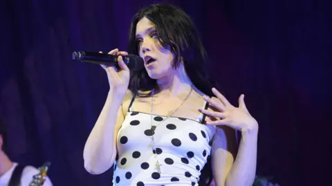Getty Images Alessi Rose pictured singing