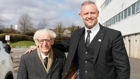 Swansea City AFC/Athena Picture Agency Francis on his 99th birthday, having been chauffeur-driven to the Swansea.com Stadium by club ambassador Lee Trundle