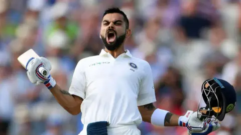 Getty Images India batsman Virat Kohli celebrates his century during day two of the First Specsavers Test Match between England and India at Edgbaston on August 2, 2018 in Birmingham, England.