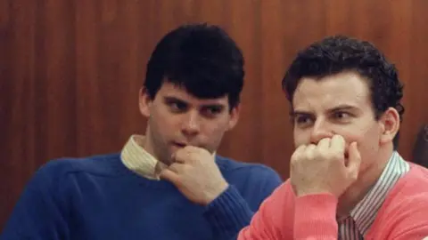 Getty Images Erik (left) and Lyle in court