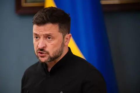 Getty Images Ukrainian President Volodymyr Zelensky speaks at a press conference following a phone conversation with U.S. President Donald Trump in Kyiv, Ukraine, on May 19, 2025.