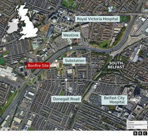 A map showing the bonfire's location. Annotated are the bonfire site, the substation (to its right) and the Donegall Road (below it). To the north east of the bonfire is the Westlink dual carriageway and further to the north is the royal Victoria Hospital. To the east is Belfast City Hospital.