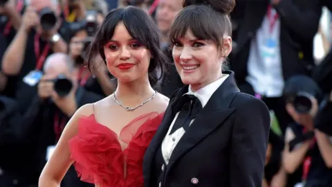 Getty Images American actresses Jenna Ortega and Winona Ryder at the 81 Venice International Film Festival 2024. Opening Ceremony and Beetlejuice Beetlejuice Red Carpet. Venice (Italy), August 28th, 2024