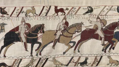 Bayeux Museum A scene showing men in horses from the 70-metre Bayeux Tapestry depicts the 1066 Norman invasion and Battle of Hastings, and is due to go on display in the Sainsbury Exhibitions Gallery at the British Museum