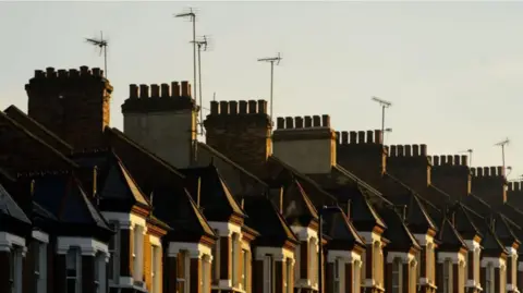 PA Media A terraced street of houses
