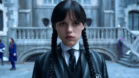 Netflix Jenna Ortega seen in Netflix's second season of Wednesday, wearing a Nevermore Academy uniform
