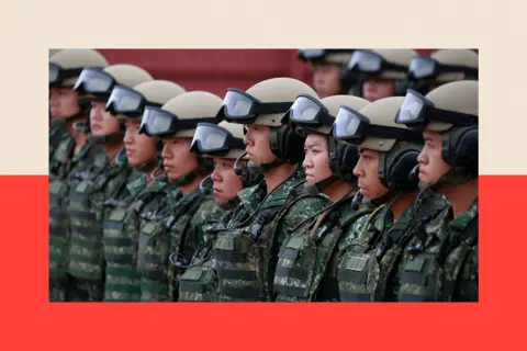RITCHIE B TONGO/EPA/Shutterstock Taiwanese military personnel listen to the speech by Taiwanese President Lai Ching-te (William Lai) (Not Pictured)