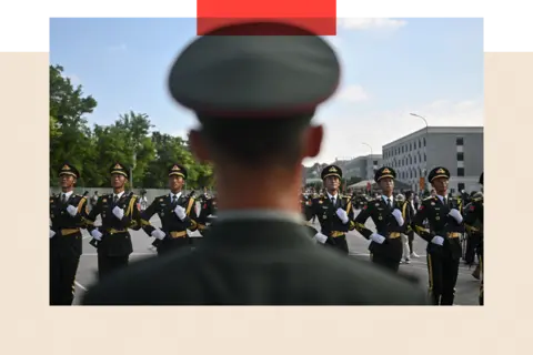 PEDRO PARDO/AFP via Getty Images Chinese military personnel take part in a rehearsal
