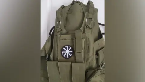 West Midlands Counter Terrorism Police A khaki tactical vest with pockets on the side and front, with a black and white symbol at the front