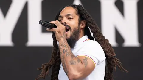 KI Price/Getty Images Bobby Vylan performing at Glastonbury on 28 June 2025