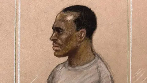Julia Quenzler/BBC A court sketch of Hadush Kebatu, who is wearing a grey sweater and has short black hair.