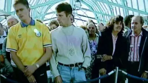 People queuing to get into Meadowhall shopping centre in 1990