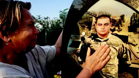 Darren Conway/BBC Serhii's parents mourn at his grave over Slovyansk