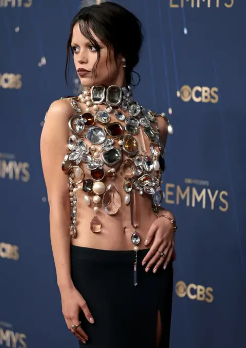 Getty Images Jenna Ortega attends the 77th Primetime Emmy Awards at Peacock Theater on September 14, 2025 in Los Angeles, California