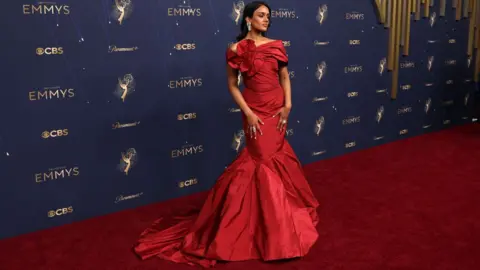 Getty Images Australian actress Shabana Azeez arrives for the 77th Primetime Emmy Awards at the Peacock Theatre at LA Live in Los Angeles on September 14, 2025