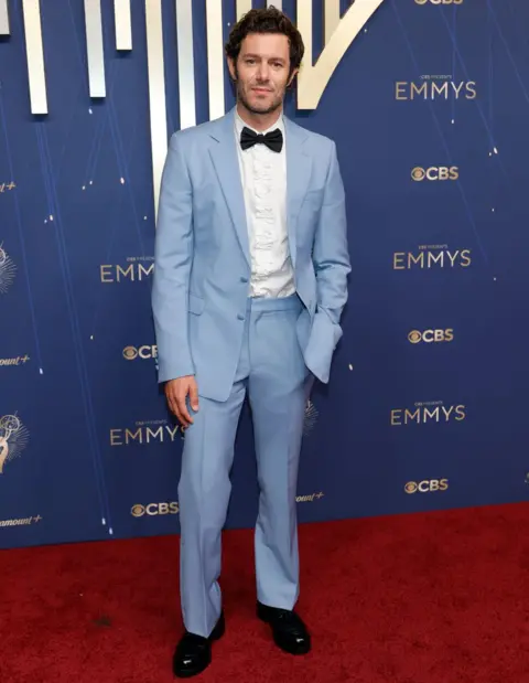 Getty Images Adam Brody attends the 77th Primetime Emmy Awards at Peacock Theater on September 14, 2025 in Los Angeles, California