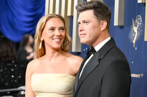 Getty Images Scarlett Johansson, Colin Jost at the 77th Primetime Emmy Awards held at the Peacock Theater on September 14, 2025 in Los Angeles, California