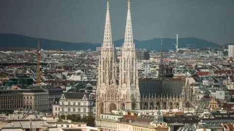 Getty Images A landscape view of the Votiv Church in Vienna and surrounding area