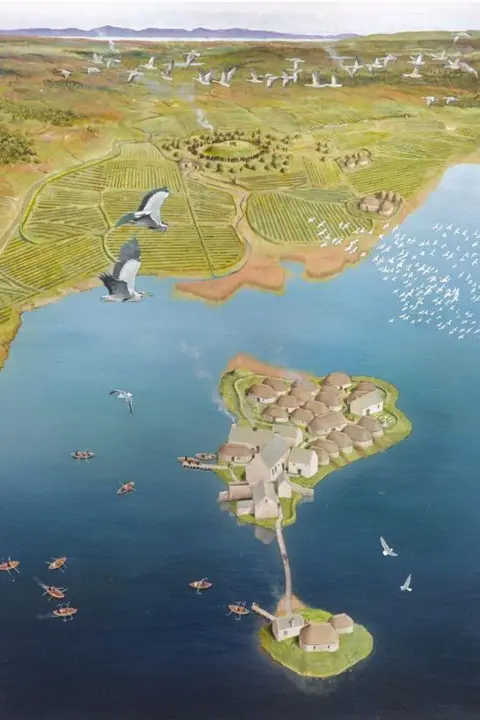 David Simon A visualisation providing an aerial view of the small islands at Finlaggan. There are clusters of thatched roof buildings on the islands. There boats on the loch's water and white birds in the sky.
