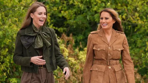 PA Media Catherine, Princess of Wales, is seen laughing with Melania Trump on the Windsor Castle estate.