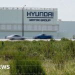 Hyundai says opening of raided plant to be delayed